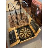 Harrows dartboard in fitted case with darts, together with three metal furnishing items, to include: