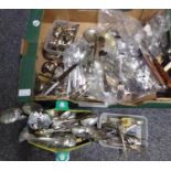 Box of loose plated and other cutlery and other table items; nutcrackers, tea strainers, small His