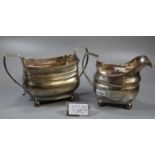 Part 19th century silver tea service, to include: two handled sucrier and cream jug, both standing