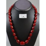 Graduated string of red beads. (B.P. 21% + VAT)