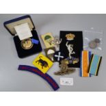 Collection of GB silver coins and military items to include: boxed medallions, uniform patches,