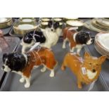 Tray of Beswick and other dog figures to include; two St Bernard's, Corgi and a Collie. (4) (B.P.