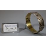 Silver gilt hinged bangle. 1.3 troy ozs approx. (B.P. 21% + VAT)