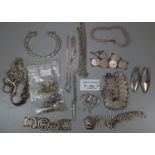 Bag of assorted silver and other white metal jewellery items, coin, bracelet, torque etc. (B.P.