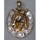 9ct gold horse's head pendant with clear stones. 3.7g approx. (B.P. 21% + VAT)