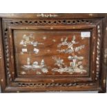 Mother of pearl inlaid Chinese hardwood panel with pierced framing. Overall 36 x 47cm approx. (B.