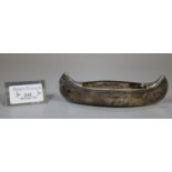 Novelty silver salt in the form of a canoe, Chester hallmarks. 1.7 troy ozs. (B.P. 21% + VAT)