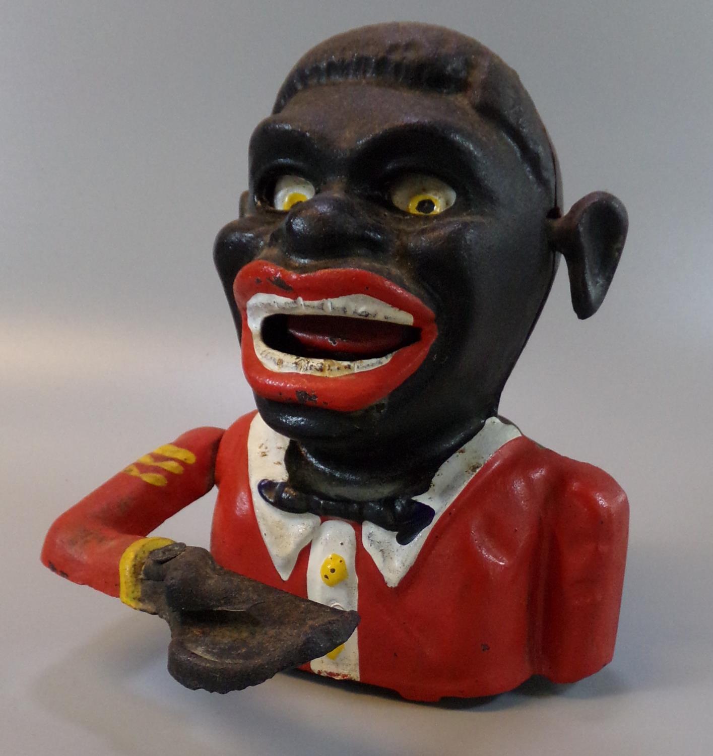 Cast metal painted black man novelty moneybox. (B.P. 21% + VAT)