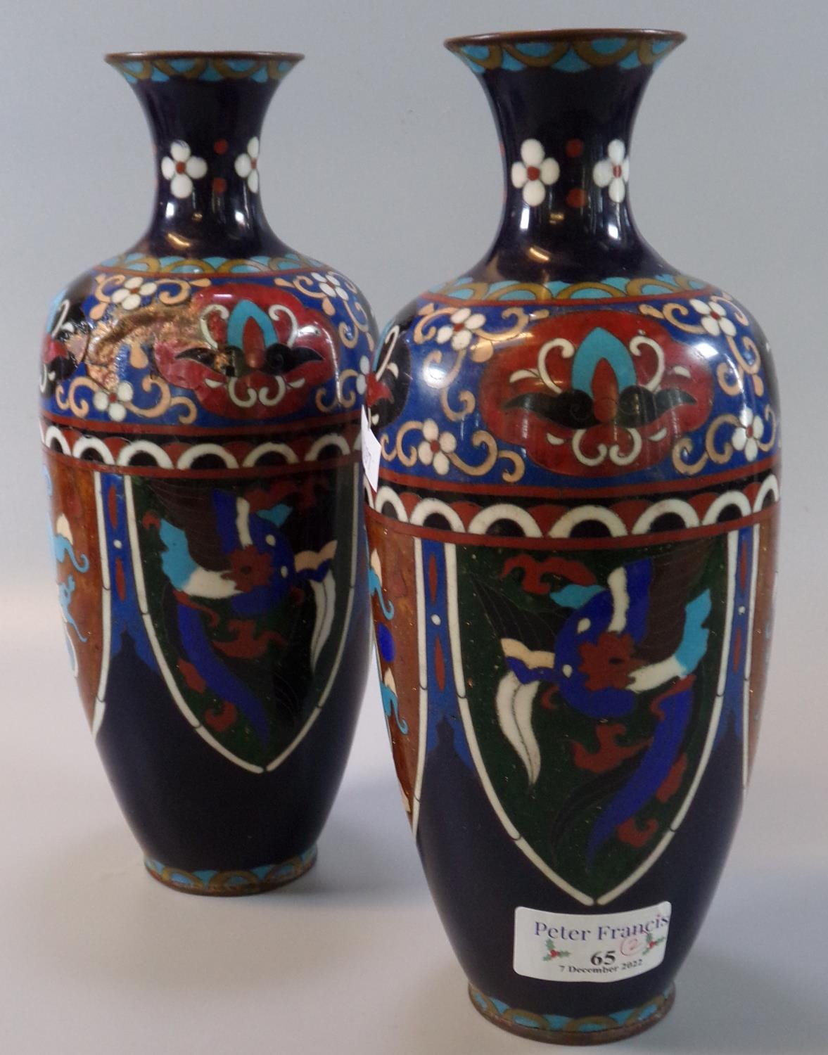 Pair of Japanese cloisonné baluster vases, the body with shields decorated with stylised