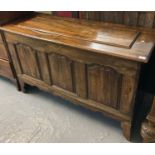18th century oak coffer, the moulded top above three ogee panels, shaped frieze on later bracket