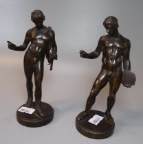 After the antique, a pair of nude Greek bronze figurines, one with discus, unmarked. 14.5cm