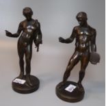 After the antique, a pair of nude Greek bronze figurines, one with discus, unmarked. 14.5cm