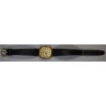 Omega gold plated lady's oval faced Deville quartz wristwatch with leather strap. Lacks crown.