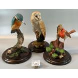 Three Country Artists hand crafted sculptures of animals to include: barn owl, robin on trowel and