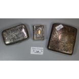Two silver foliate chased cigarette cases. 5.1 troy ozs. together with novelty white metal vesta
