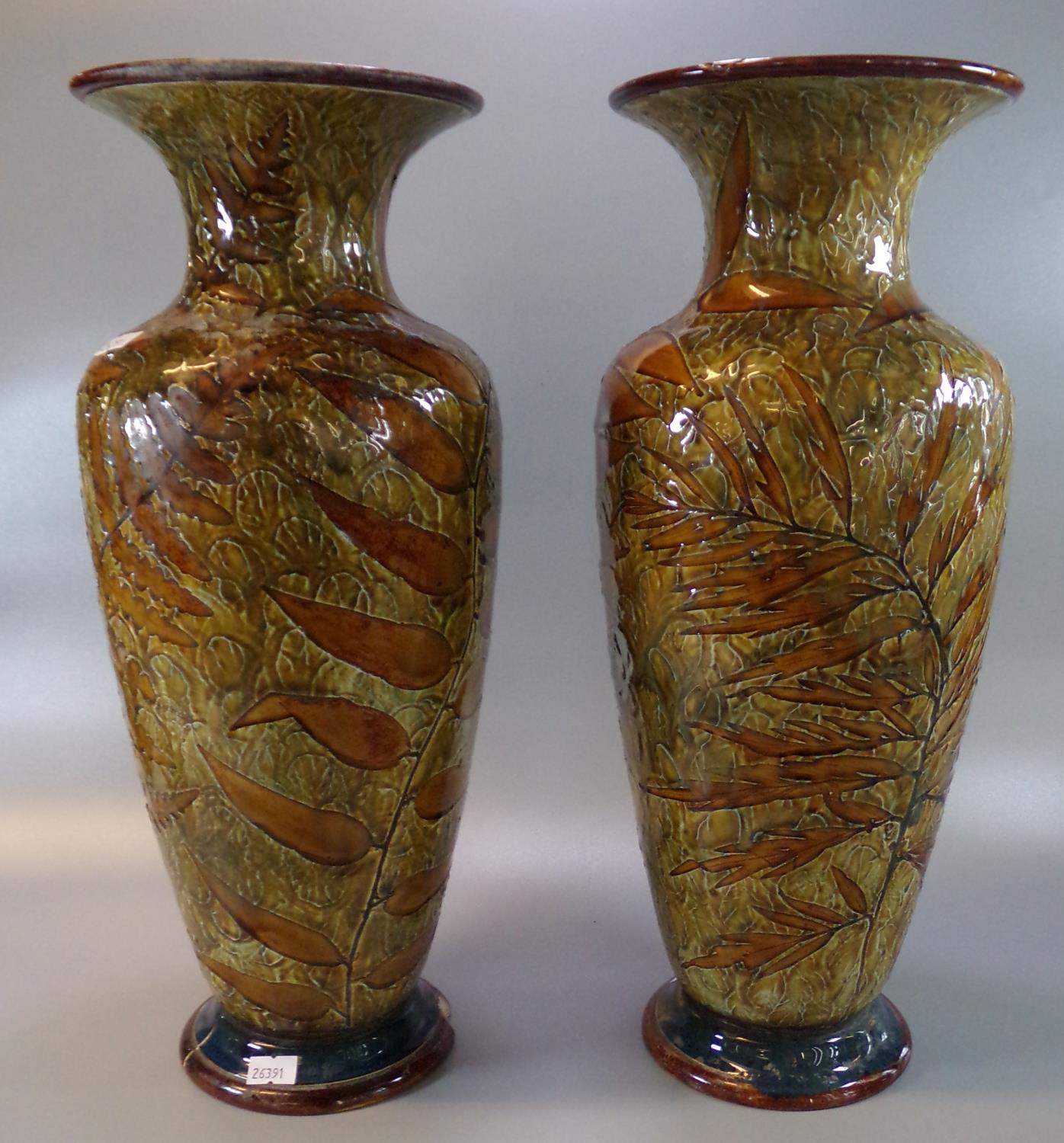 Pair of late 19th/early 20th Century Doulton Lambeth stoneware vases overall decorated with Autumn