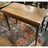 Late 18th/19th century mahogany fold over card table on tapering legs. (B.P. 21% + VAT)