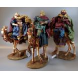 Modern figural Christmas group of the Three Wise Men, seated on camels. (B.P. 21% + VAT)