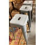 Set of three metal industrial style barstools with handholes. (3) (B.P. 21% + VAT)