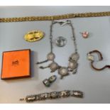 Collection of jewellery including ladies dress watch, gold finish cufflinks, studs, brooches,