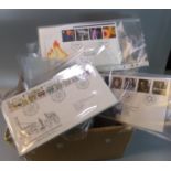 Great Britain stamp collection of First Day Covers in box, sorted into packets. 1960's to 2002