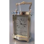 Royal Silver Jubilee 1952-1977 carriage clock, having silvered case and standing on turned feet. (