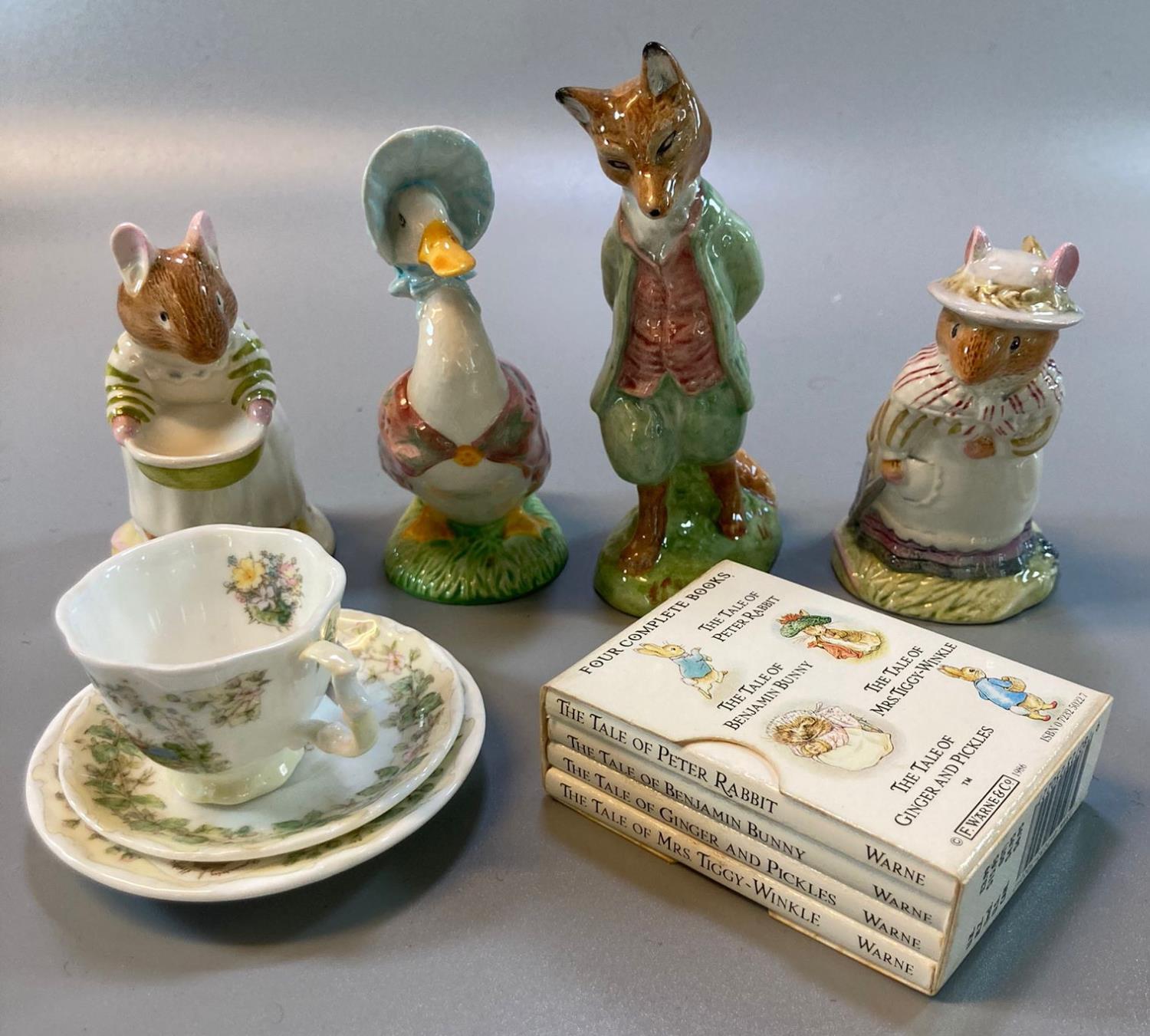 Two Royal Albert Beatrix Potter figurines, to include; Jemima Puddleduck and Foxy Whiskered