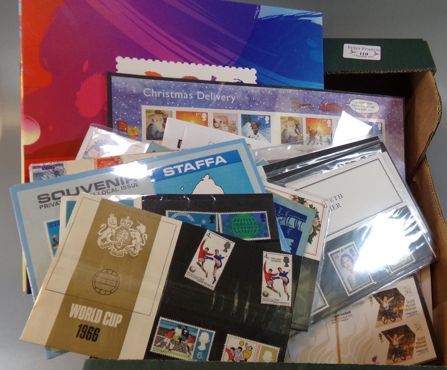 Box with all world selection of stamps including; China 2010 year book, Great Britain Christmas