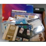 Box with all world selection of stamps including; China 2010 year book, Great Britain Christmas