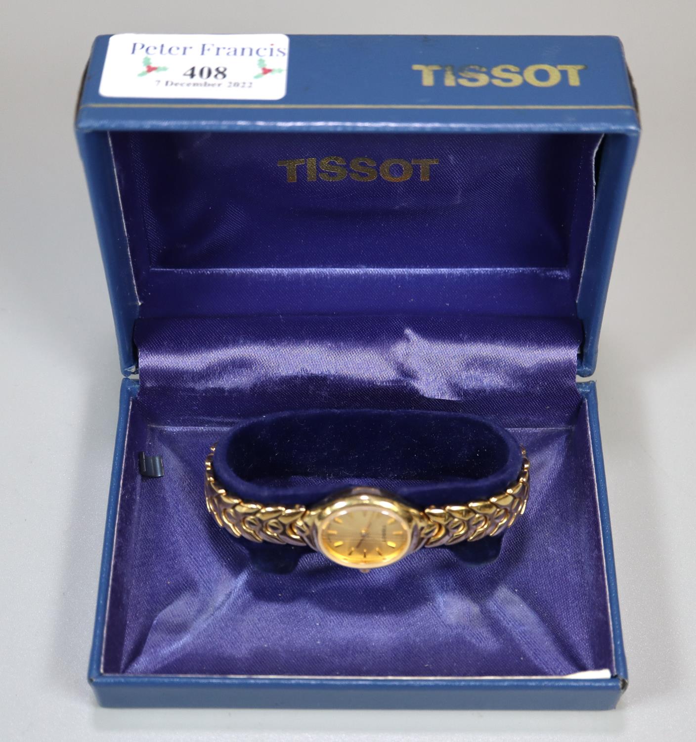 Tissot lady's gold plated wristwatch, appearing in original box, with original receipt. (B.P.