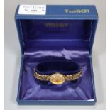 Tissot lady's gold plated wristwatch, appearing in original box, with original receipt. (B.P.