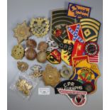 Bag of Commonwealth cap badges and embroidered badges to include: Ontario Northland Railway, Flint &