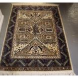 Small middle eastern design cream and blue ground carpet, having geometric floral and foliate