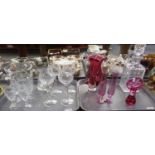Two trays of cut glass and cranbury glass: four cut glass hock glasses and four cut glass liqueur