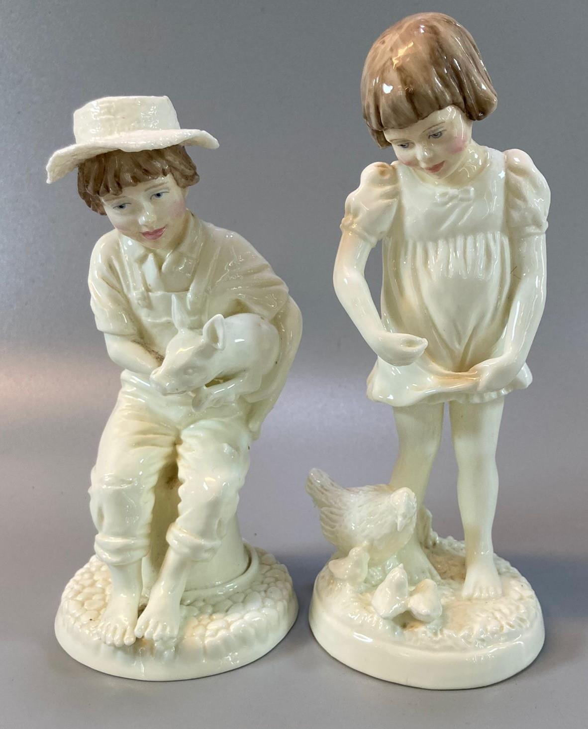 Two Royal Worcester blanc de chine figurines to include: 'Pick of the litter' and 'feeding