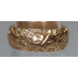 9ct gold engraved wedding ring. 3.8g approx. Size I & 1/2.(B.P. 21% + VAT)