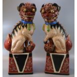 Pair of Chinese porcelain polychrome Temple lions or Fo Dogs. 45cm high approx. 20th century. (2) (