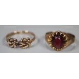 Two 9ct gold garnet set dress rings. 5.8g approx. Size O 1/2. (B.P. 21% + VAT)