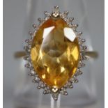 9ct gold diamond and citrine dress ring. 3.9g approx. Ring size O. (B.P. 21% + VAT)