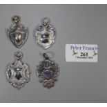 Four silver watch chain shield shaped fobs. 1 troy oz approx. (B.P. 21% + VAT)