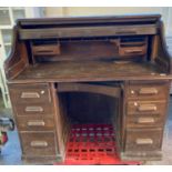 Early 20th century oak 'S' roll knee hole desk. (B.P. 21% + VAT)