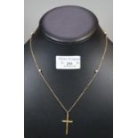 9ct gold engraved crucifix on fine linked gold chain set with opals. Total weight 5.5g approx. (B.P.