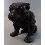 Early 20th century ceramic study of a seated bulldog with glass eyes impressed marks 'Made in
