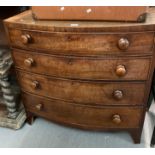 19th century mahogany bow front chest of four long drawers on bracket feet. (B.P. 21% + VAT)