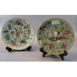 Two similar Chinese porcelain Famille rose dishes on a celadon glaze decorated with birds,