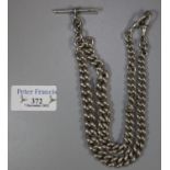 Heavy silver curb link graduated Albert watch chain with two spring clasps and T bar. 3.25troy ozs