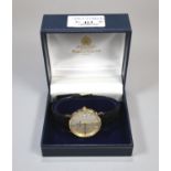 Yellow metal Mappin & Webb presentation gent's wristwatch dated 1985 with black leather strap, in
