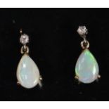 Pair of opal and diamond drop earrings. (B.P. 21% + VAT)