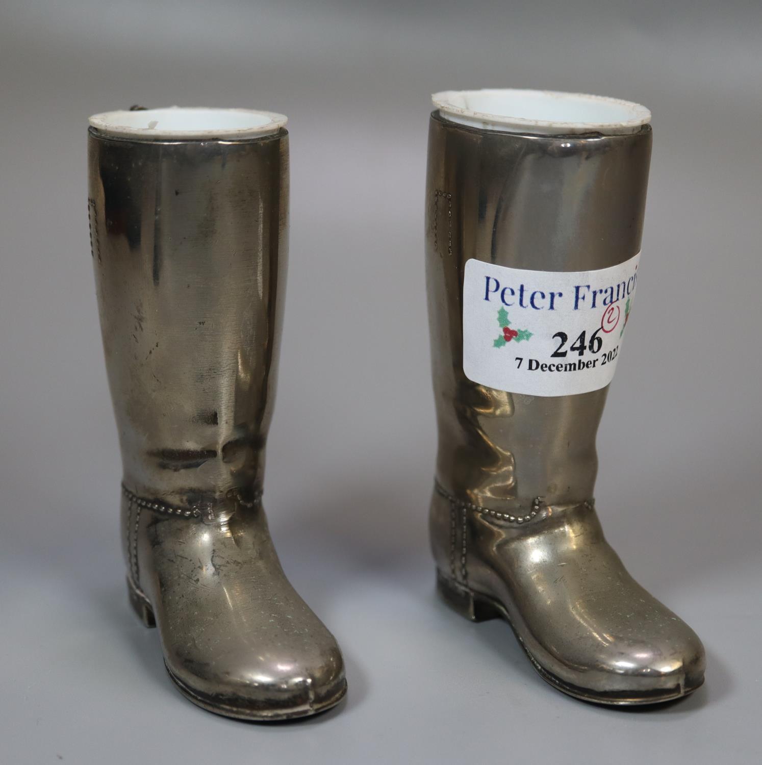 Pair of miniature silver plated stirrup cups in the form of riding boots. (B.P. 21% + VAT)