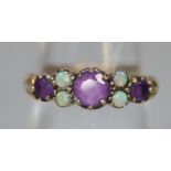 9ct gold amethyst and opal dress ring. 2.2g approx. Ring size O. (B.P. 21% + VAT)